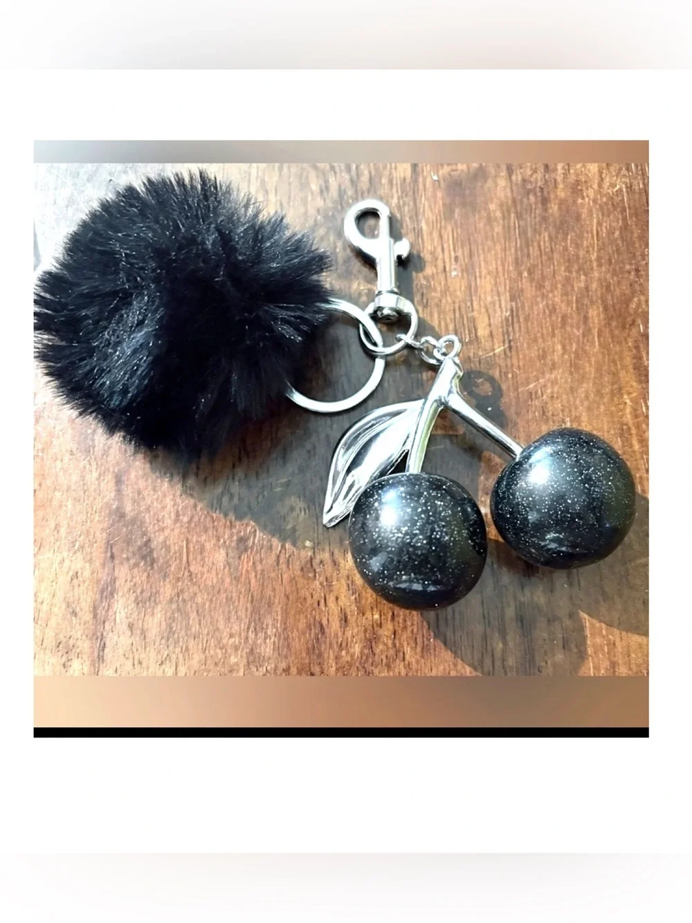 NWOT Elegant Black and Silver Cherry Key Holder With Black Pom Pom